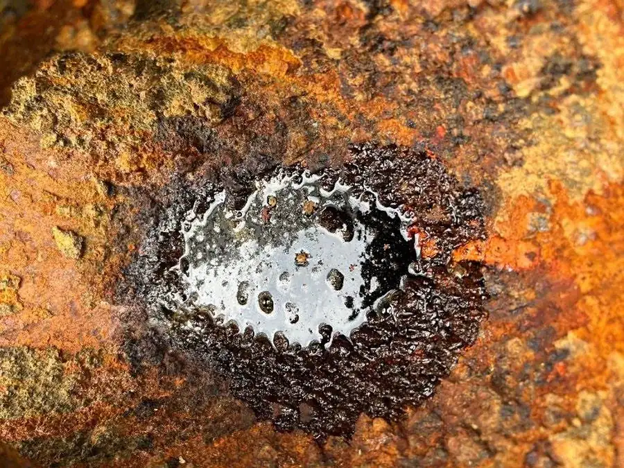 Two-decade rust and scale on equipment before treatment