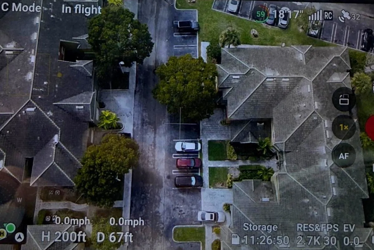 Dirty UF Shands campus rooftops before VertKleen drone wash